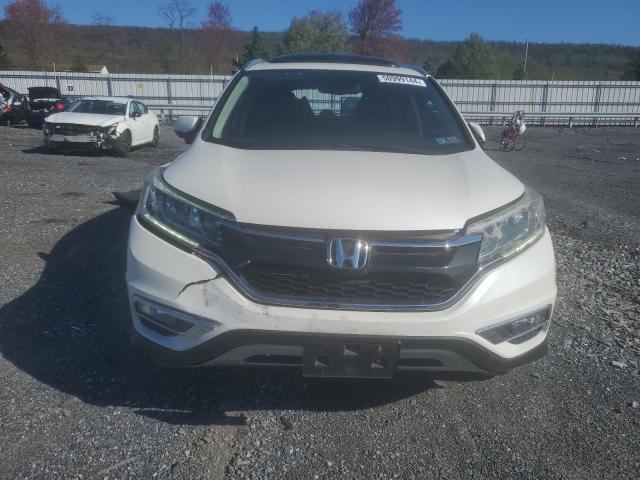 Photo 5 from auction – 2016 HONDA CR-V EXL with VIN 5J6RM4H75GL113708