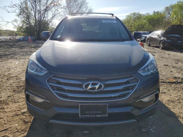 Photo 5 from auction – 2017 HYUNDAI SANTA FE S with VIN 5NMZU3LB0HH037636