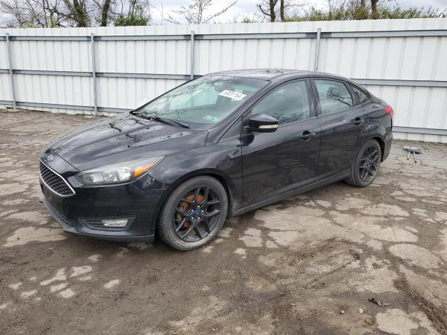 FORD FOCUS SE 2016 with VIN 1FADP3F27GL309664 - Photo from auction