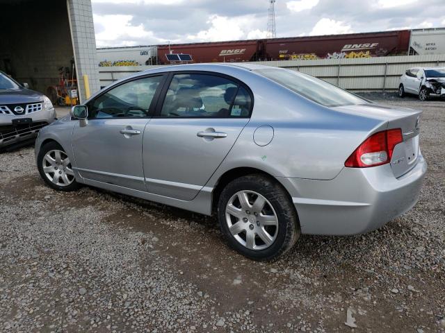 Photo 2 from auction – 2011 HONDA CIVIC LX with VIN 19XFA1F50BE021408