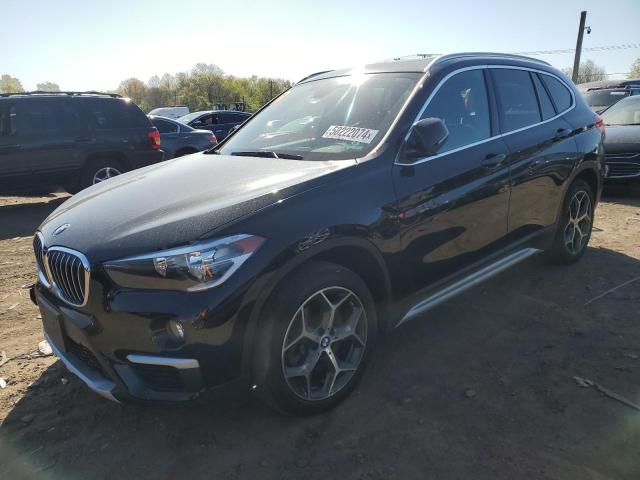BMW X1 XDRIVE2 2018 with VIN WBXHT3C36J5L33148 - Photo from auction