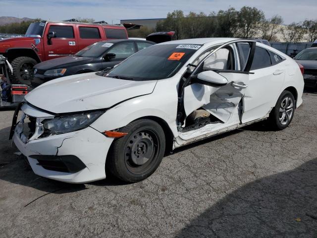 HONDA CIVIC LX 2018 with VIN 2HGFC2F55JH603783 - Photo from auction