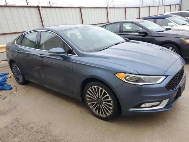 Photo 4 from auction – 2018 FORD FUSION TIT with VIN 3FA6P0D94JR132667