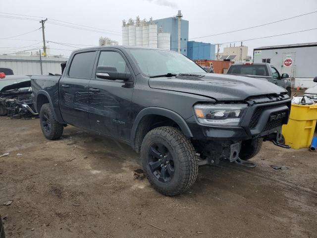 Photo 4 from auction – 2021 RAM 1500 REBEL with VIN 1C6SRFLT0MN573200