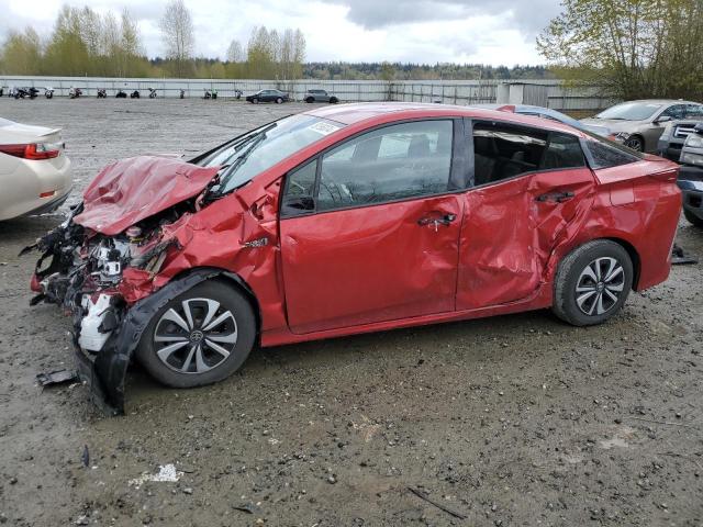 TOYOTA PRIUS PRIM 2018 with VIN JTDKARFP6J3072576 - Photo from auction