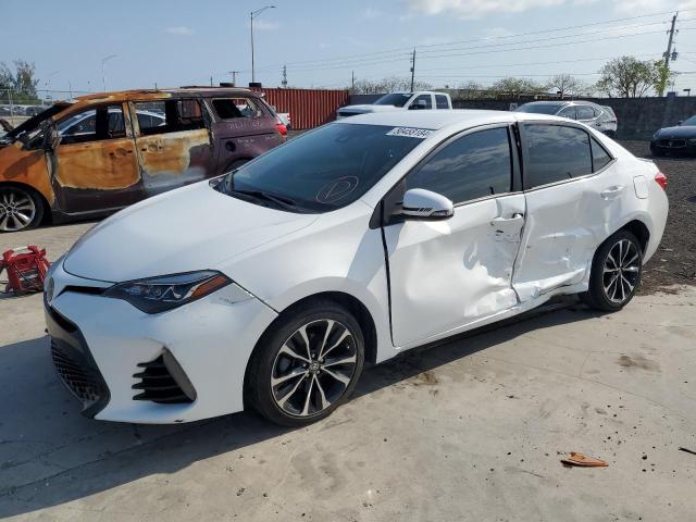 TOYOTA COROLLA L 2017 with VIN 2T1BURHE4HC843315 - Photo from auction