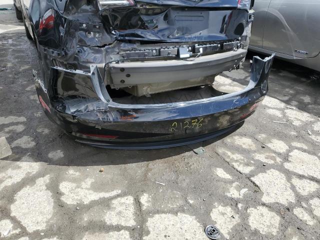 Photo 12 from auction – 2018 TESLA MODEL 3 with VIN 5YJ3E1EB9JF073319