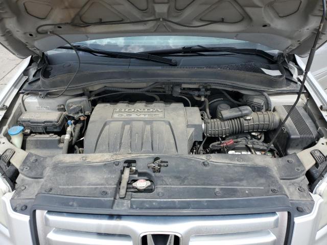 Foto 12 de la subasta – 2006 HONDA PILOT EX con VIN 5FNYF18586B006842