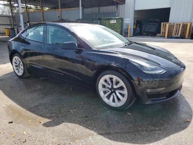 Photo 4 from auction – 2023 TESLA MODEL 3 with VIN 5YJ3E1EA4PF430566
