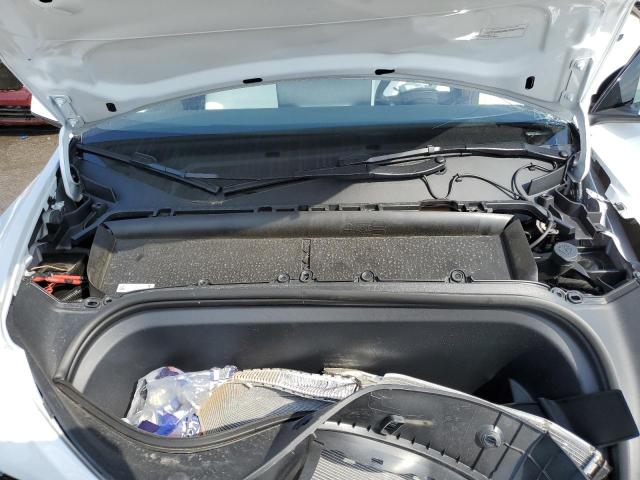 Photo 11 from auction – 2023 TESLA MODEL Y with VIN 7SAYGDEEXPF633646