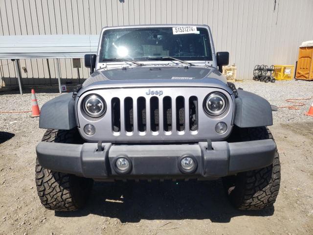 Photo 5 from auction – 2016 JEEP WRANGLER U with VIN 1C4BJWDG7GL119236