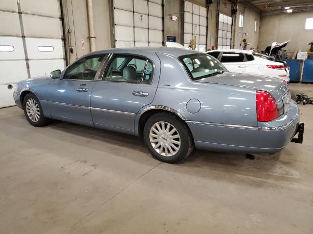 Photo 2 from auction – 2004 LINCOLN TOWN CAR E with VIN 1LNHM81W94Y638937