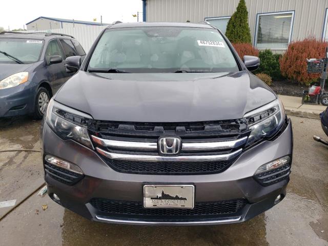 Photo 5 from auction – 2017 HONDA PILOT TOUR with VIN 5FNYF6H99HB040579