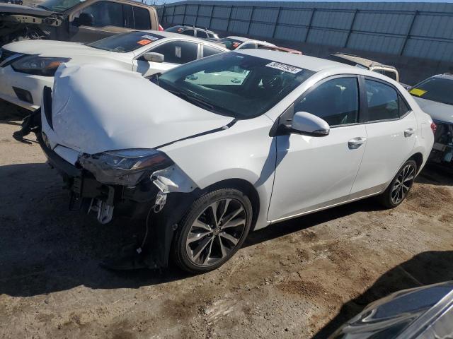 TOYOTA COROLLA L 2017 with VIN 5YFBURHE9HP641439 - Photo from auction