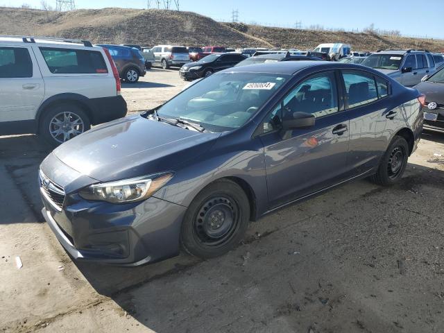 SUBARU IMPREZA 2017 with VIN 4S3GKAA66H3614028 - Photo from auction