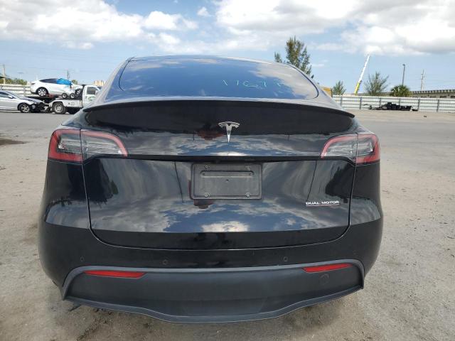 Photo 6 from auction – 2022 TESLA MODEL Y with VIN 7SAYGDEF8NF318673