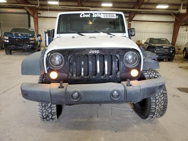 Photo 5 from auction – 2015 JEEP WRANGLER U with VIN 1C4BJWFG2FL664448