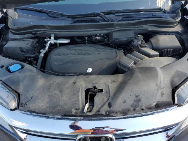 Photo 12 from auction – 2022 HONDA PILOT TOUR with VIN 5FNYF6H69NB017627