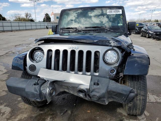 Photo 5 from auction – 2014 JEEP WRANGLER U with VIN 1C4BJWDG3EL179883