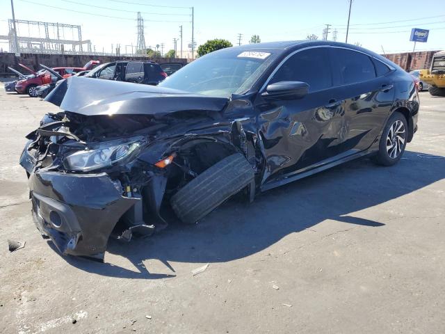 HONDA CIVIC EX 2017 with VIN 19XFC2F8XHE051938 - Photo from auction