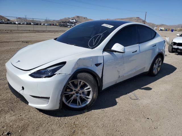 TESLA MODEL Y 2022 with VIN 7SAYGAEE2NF556539 - Photo from auction