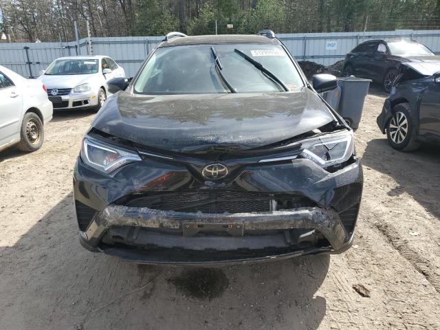 Photo 5 from auction – 2018 TOYOTA RAV4 LE with VIN 2T3BFREV0JW707533