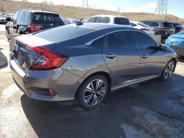 Photo 3 from auction – 2018 HONDA CIVIC EX with VIN 19XFC1E37JE003643