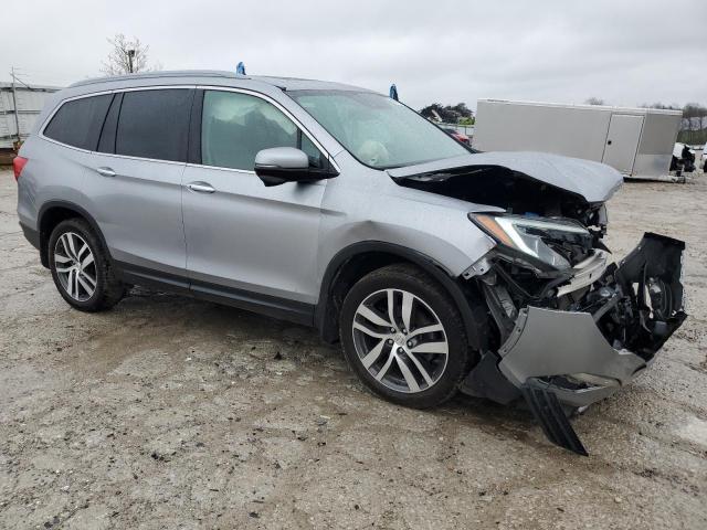 Photo 4 from auction – 2017 HONDA PILOT TOUR with VIN 5FNYF6H99HB021210