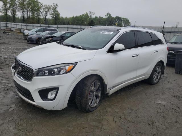 KIA SORENTO SX 2016 with VIN 5XYPK4A58GG185235 - Photo from auction