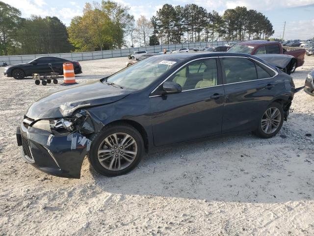 TOYOTA CAMRY LE 2017 with VIN 4T1BF1FK4HU696030 - Photo from auction