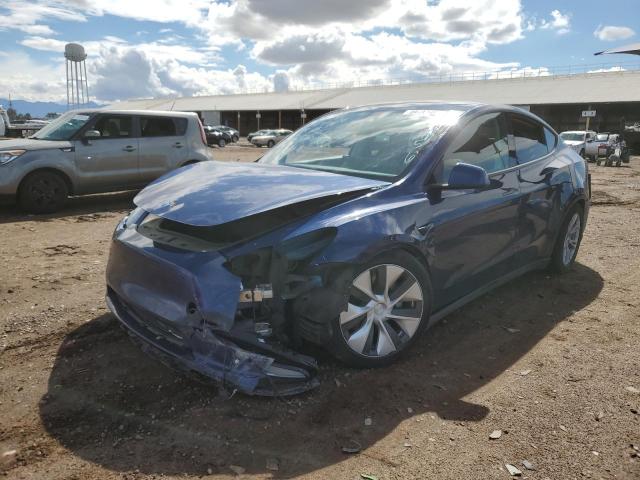 TESLA MODEL Y 2022 with VIN 7SAYGAEE3NF329456 - Photo from auction