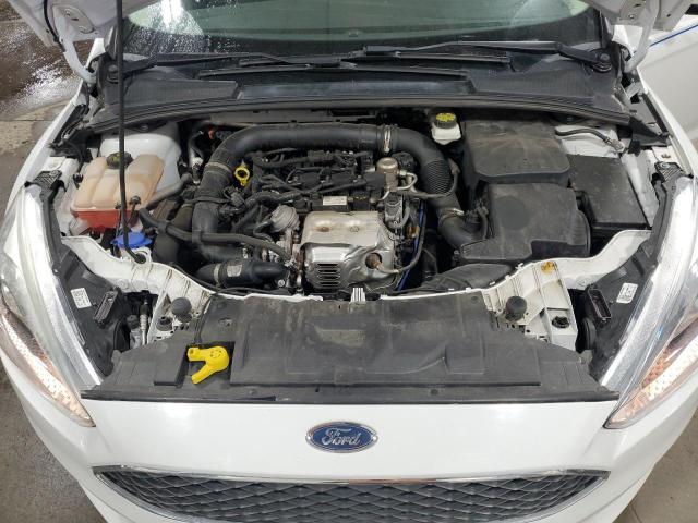 Photo 11 from auction – 2017 FORD FOCUS SE with VIN 1FADP3FE3HL260104