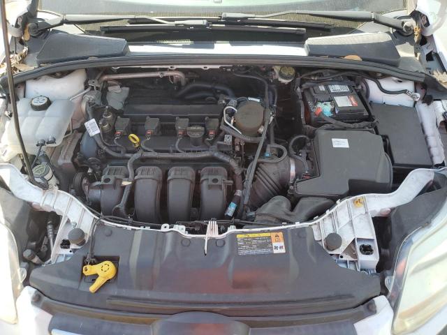 Photo 11 from auction – 2013 FORD FOCUS SE with VIN 1FADP3F22DL359920