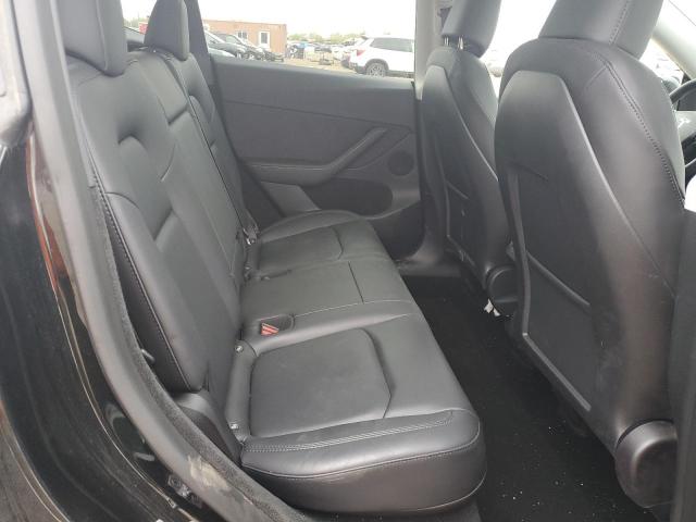 Photo 10 from auction – 2023 TESLA MODEL Y with VIN 7SAYGDEE0PF696688