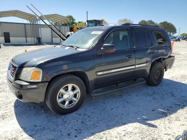 GMC ENVOY 2003 with VIN 1GKDS13SX32308854 - Photo from auction