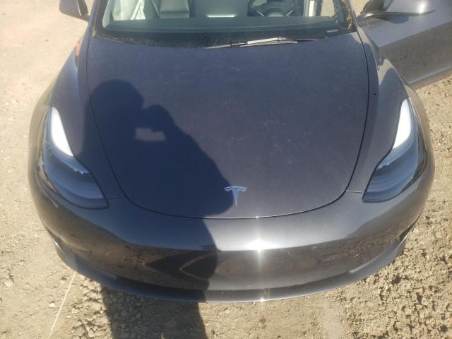 Photo 11 from auction – 2023 TESLA MODEL 3 with VIN 5YJ3E1EB6PF714287