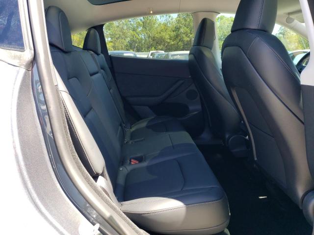 Photo 11 from auction – 2023 TESLA MODEL Y with VIN 7SAYGDEE9PA053124