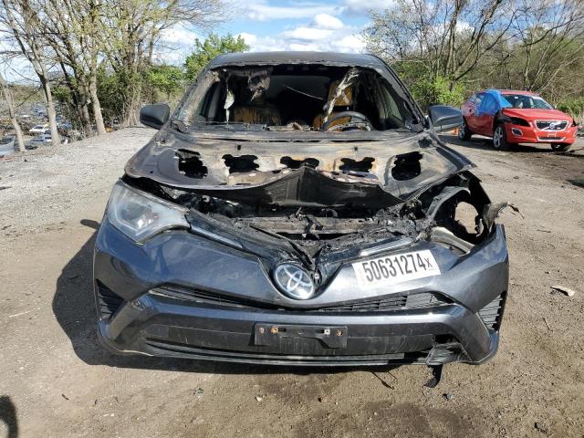 Photo 5 from auction – 2018 TOYOTA RAV4 LE with VIN JTMBFREV3JJ225167