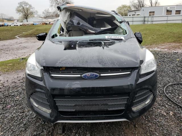 Photo 5 from auction – 2016 FORD ESCAPE SE with VIN 1FMCU9GX1GUB18730