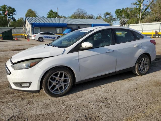 FORD FOCUS SE 2015 with VIN 1FADP3F21FL231171 - Photo from auction
