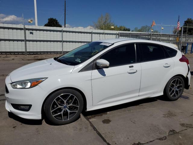 FORD FOCUS SE 2015 with VIN 1FADP3K21FL277752 - Photo from auction
