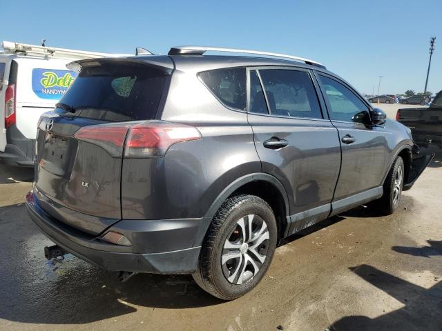 Photo 3 from auction – 2016 TOYOTA RAV4 LE with VIN JTMZFREV9GJ094219