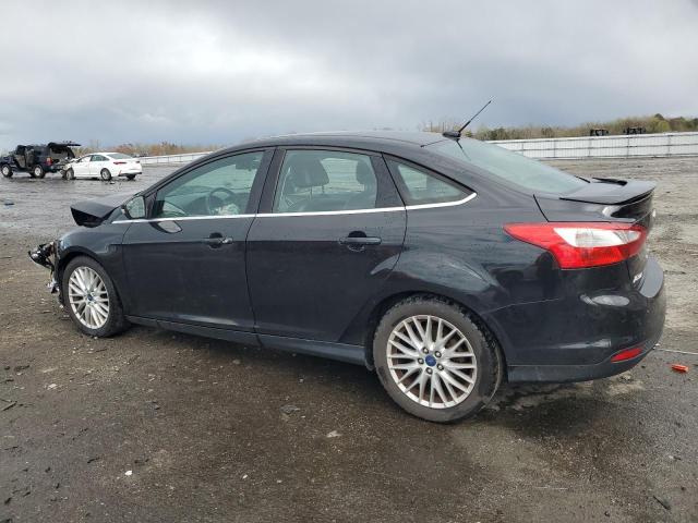 Photo 2 from auction – 2014 FORD FOCUS TITA with VIN 1FADP3J2XEL101802