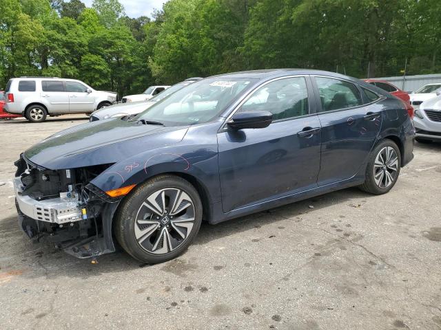 HONDA CIVIC EX 2017 with VIN 19XFC1F32HE000254 - Photo from auction