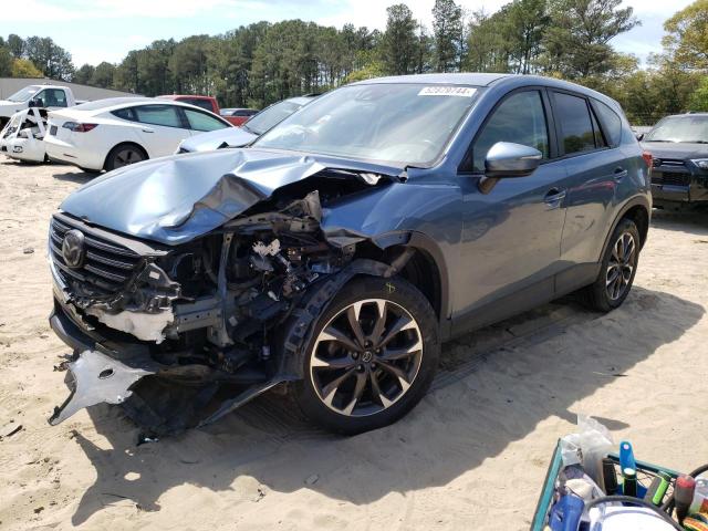 MAZDA CX-5 GT 2016 with VIN JM3KE4DY8G0868122 - Photo from auction
