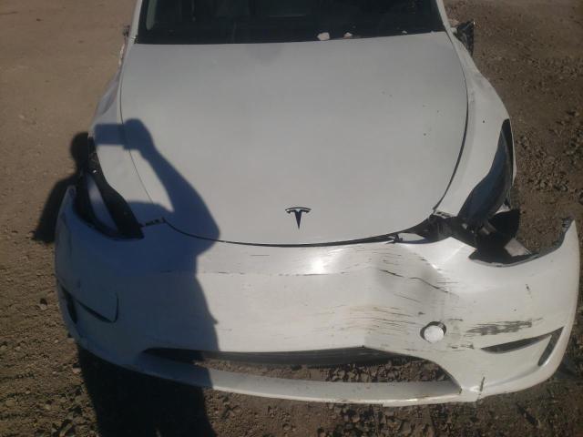 Photo 11 from auction – 2023 TESLA MODEL Y with VIN 7SAYGDEE6PF781731