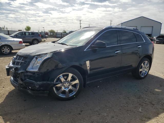 CADILLAC SRX PREMIU 2011 with VIN 3GYFNKE63BS515570 - Photo from auction