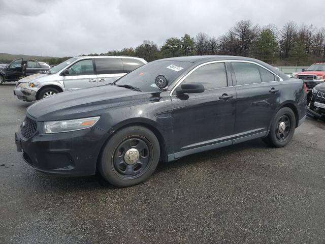 FORD TAURUS POL 2013 with VIN 1FAHP2M85DG130563 - Photo from auction