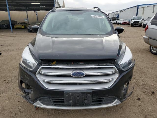 Photo 5 from auction – 2018 FORD ESCAPE SE with VIN 1FMCU9GD6JUD21268