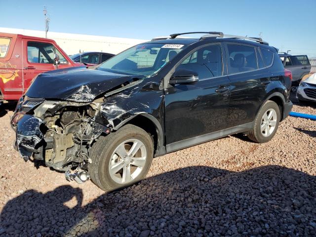 TOYOTA RAV4 XLE 2014 with VIN 2T3WFREV4EW102499 - Photo from auction